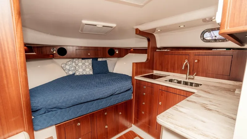 Slide: The Image of 2018 Pursuit 385 Offshore "TAG TEAM" - Cozy Cabin with Galley Area - 8