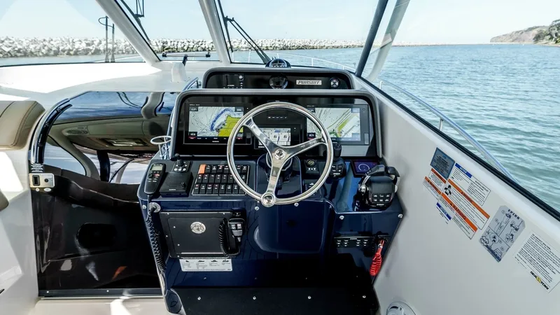 Slide: The Image of 2018 Pursuit 385 Offshore "TAG TEAM" - Helm Station with Navigation Screens - 23