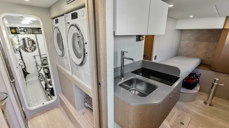 Slide: The Image of Utility Room with Laundry and Sink - 33