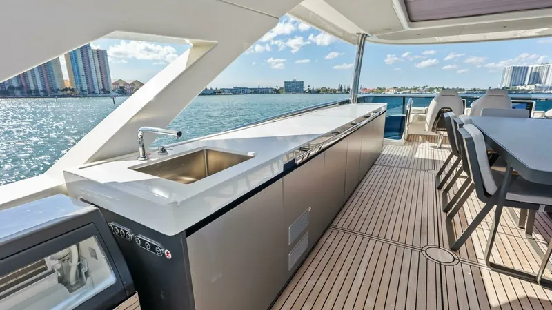 Slide: The Image of Spacious Flybridge with Wet Bar - 65