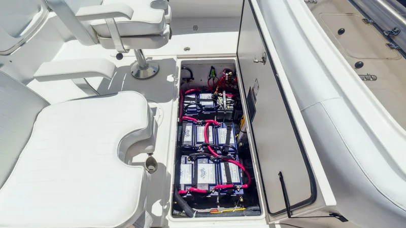 Slide: The Image of 2008 Fountain 38 Sportfishing Cruiser - "SWIFT SERENITY": Cockpit Battery Compartment Access - 11