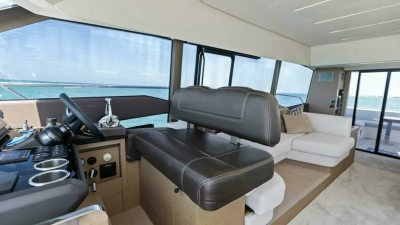 Slide: The Image of 2022 59 Prestige Flybridge - How Sweet It Its - Helm - 18