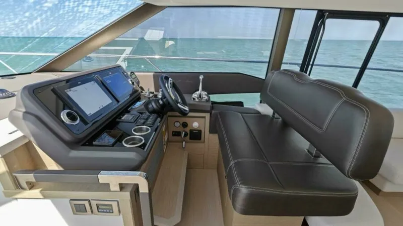 Slide: The Image of 2022 59 Prestige Flybridge - How Sweet It Its - Helm - 19