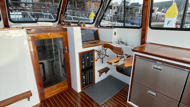 Slide: The Image of 2019 Donelle 35 Flybridge Sportfish "BEAR FLAG 3.0" - Helm Station with Teak Accents - 3