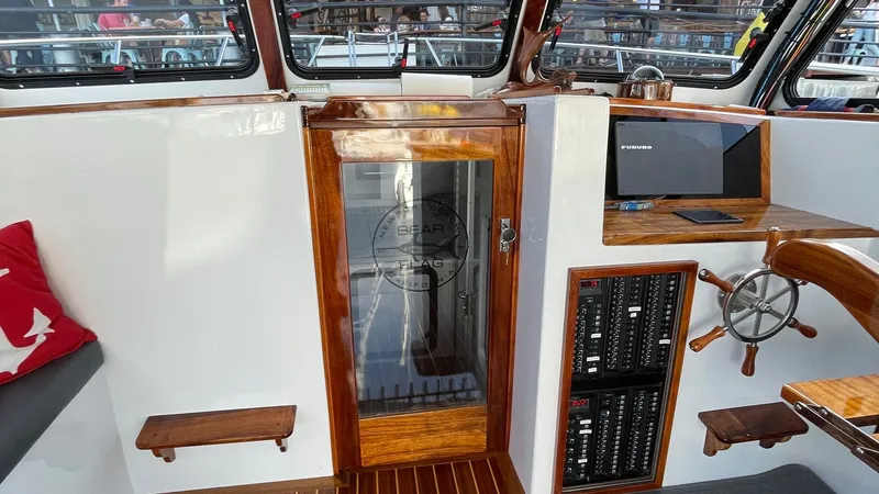 Slide: The Image of 2019 Donelle 35 Flybridge Sportfish "BEAR FLAG 3.0" - Helm Station and Cabin Entry - 7