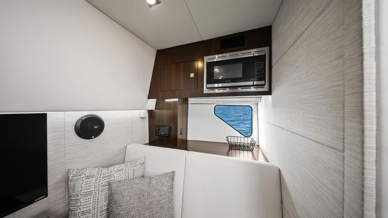 Slide: The Image of Modern Galley with Microwave and Seating - 35