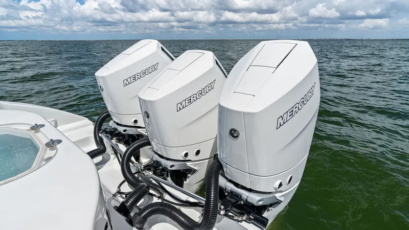 Slide: The Image of Triple Outboard Engines on Aft Deck - 10