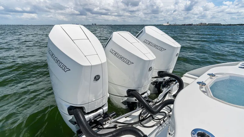 Slide: The Image of Triple Mercury Outboards on Transom - 9