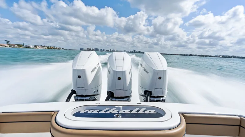 Slide: The Image of Triple Outboard Engines in Action - 16