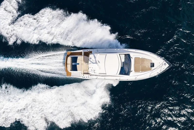 Slide: The Image of Aerial view of 2017 Pursuit SC 365i Sport Coupe cruising on open water. - 3
