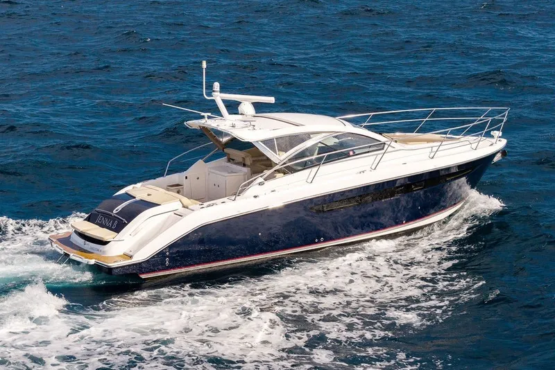 Slide: The Image of 2017 Pursuit SC 365i Sport Coupe cruising on open water. - 8