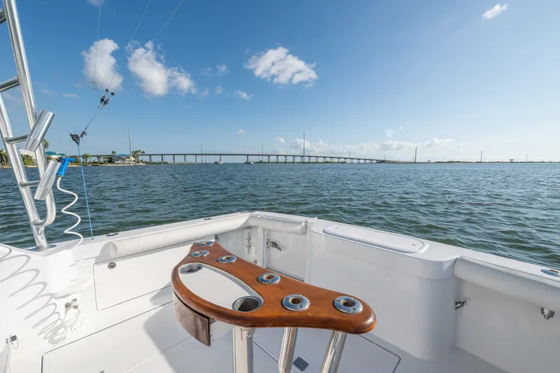Slide: The Image of 2005 Cabo 35 Express boat deck with ocean view and clear blue sky. - 13