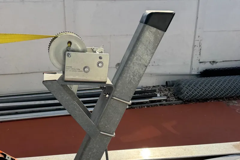 Slide: The Image of Trailer winch mechanism on a 2001 Century 2900 Center Console boat trailer. - 19