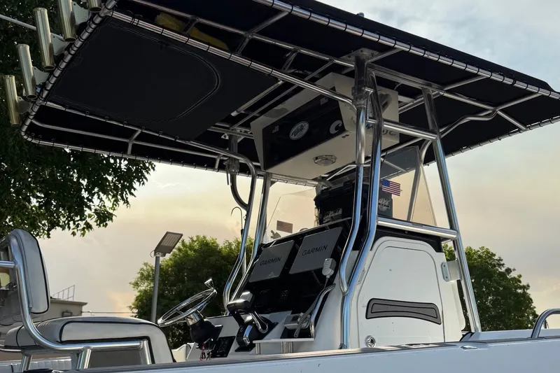 Slide: The Image of 2001 Century 2900 Center Console boat with Garmin electronics and T-top canopy. - 22