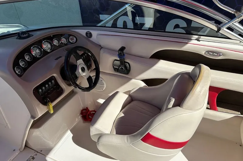 Slide: The Image of Interior of a 2000 Chaparral 216 SSi boat with steering wheel and gauges. - 21
