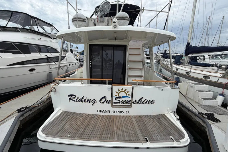 Slide: The Image of 2019 Beneteau Swift Trawler 44 docked, named "Riding On Sunshine," Channel Islands, CA. - 5