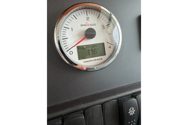 Slide: The Image of Volvo Penta tachometer showing 116 engine hours on Beneteau Swift Trawler 44, 2019 model. - 21