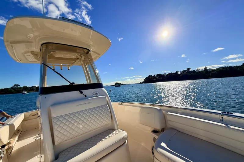 Slide: The Image of 2025 Grady-White Fisherman 257 boat on sunny, scenic waterway. - 8