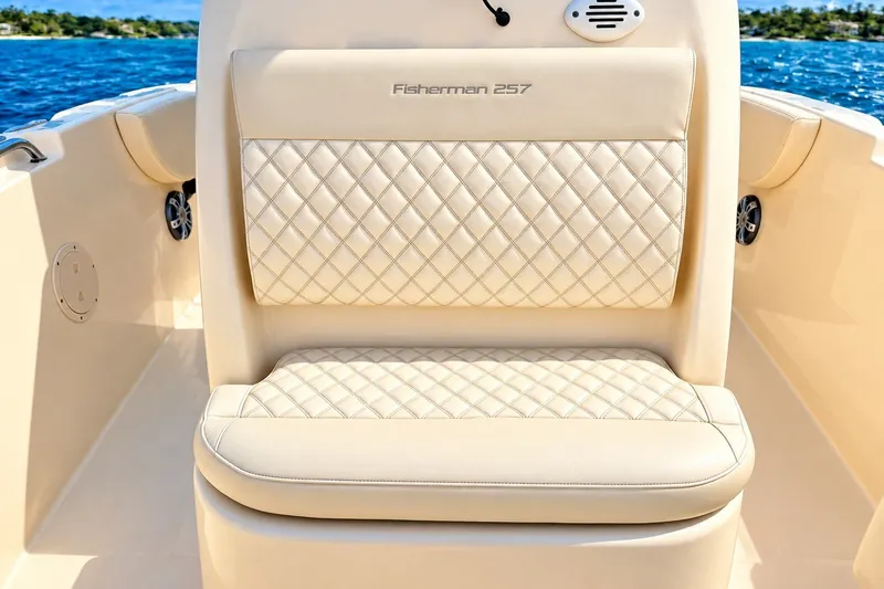 Slide: The Image of 2025 Grady-White Fisherman 257 boat seat with diamond stitching, ocean backdrop. - 15