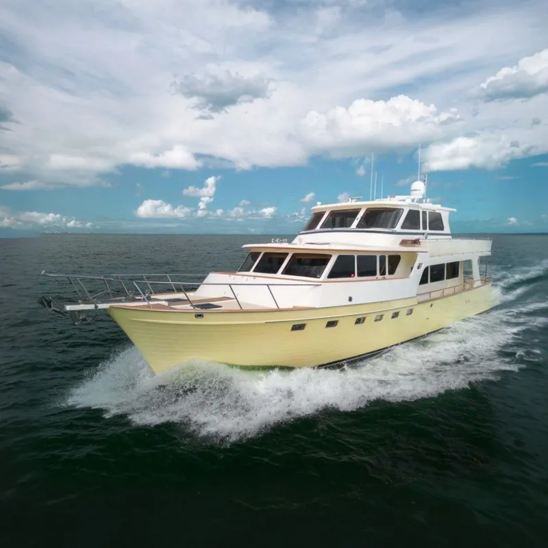 The Image of Luxury 2006 Marlow 72E LRC yacht cruising on open water. - 0