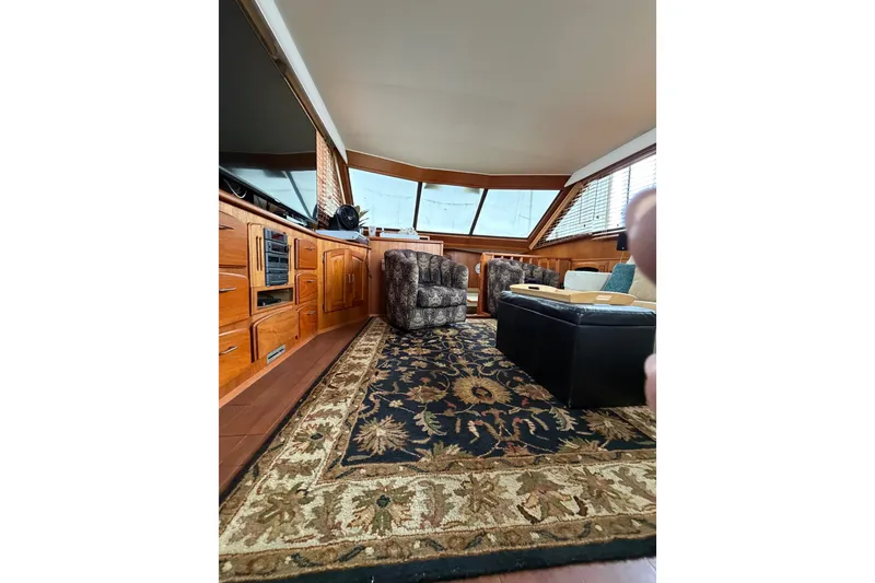 Slide: The Image of Luxurious interior of a 1989 Californian Aft Cabin yacht with elegant furnishings and decor. - 20