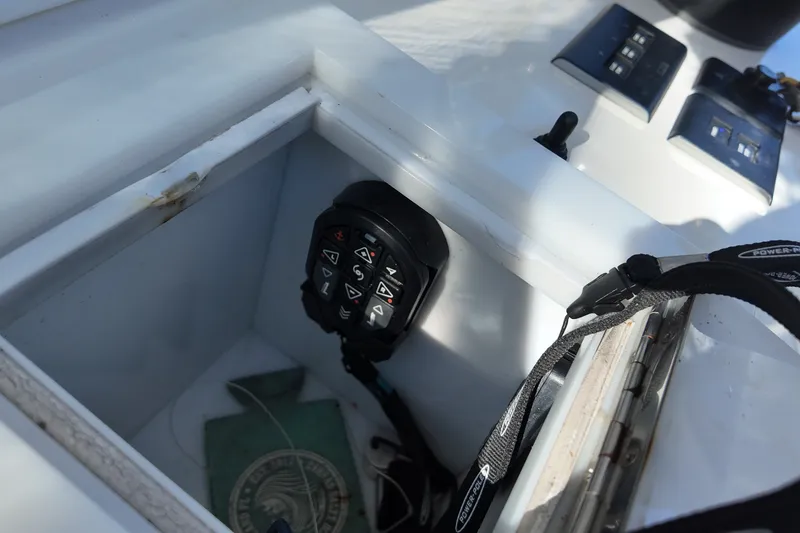 Slide: The Image of Control panel on 2017 SeaHunter 41 Tournament boat, featuring various switches and controls. - 34