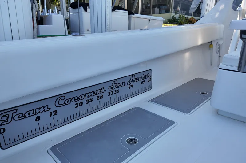 Slide: The Image of 2017 SeaHunter 41 Tournament boat interior with custom measuring ruler and storage compartments. - 31
