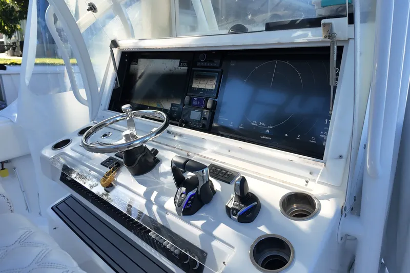 Slide: The Image of Helm of 2017 SeaHunter 41 Tournament boat with advanced navigation systems. - 14