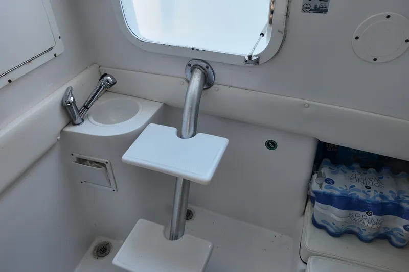 Slide: The Image of Interior of 2017 SeaHunter 41 Tournament boat with sink and storage area. - 27