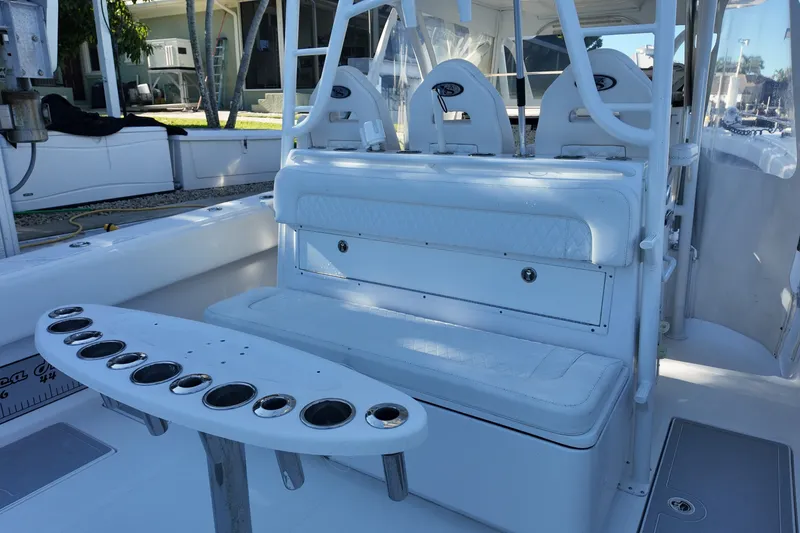 Slide: The Image of 2017 SeaHunter 41 Tournament boat interior with seating and rod holders. - 16