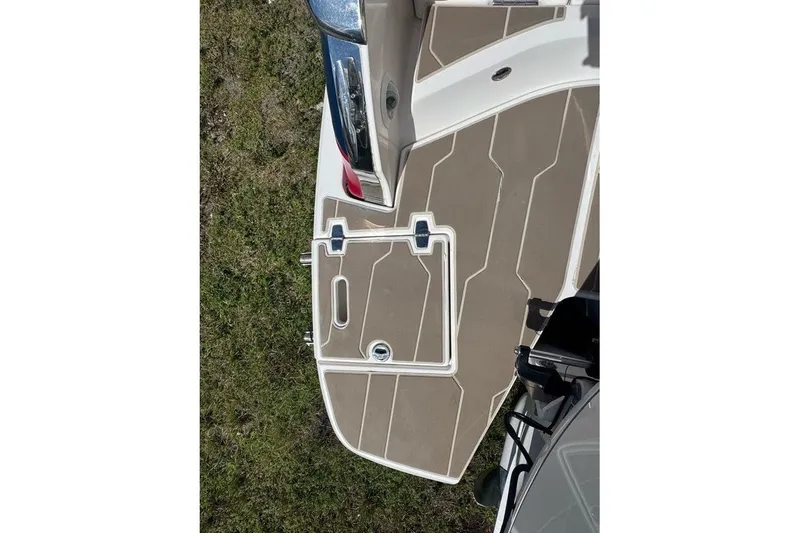 Slide: The Image of 2021 Regal 29 OBX boat deck with sleek design and modern features. - 27