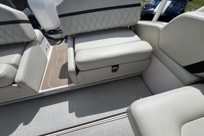 Slide: The Image of 2021 Regal 29 OBX boat interior with luxurious white seating and modern design. - 24