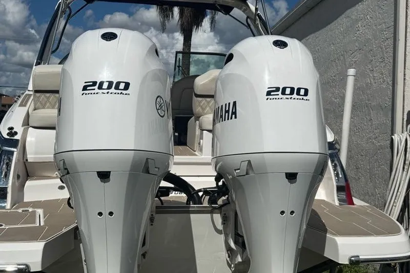 Slide: The Image of 2021 Regal 29 OBX boat with twin Yamaha 200 horsepower outboard engines. - 29