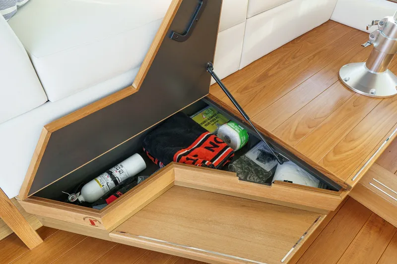 Slide: The Image of Storage compartment in 2021 Tiara C 44 Coup yacht with safety equipment and supplies. - 29