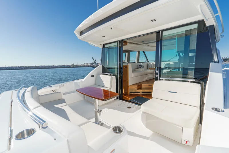 Slide: The Image of Luxurious 2021 Tiara C 44 Coup yacht with spacious deck and elegant interior. - 6