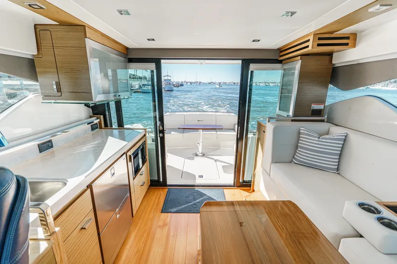 Slide: The Image of Luxurious interior of 2021 Tiara C 44 Coup yacht with ocean view. - 12