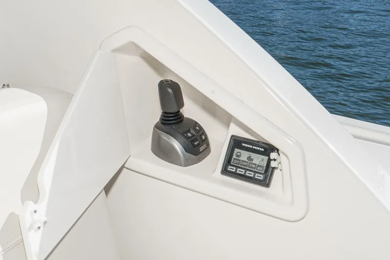 Slide: The Image of Control panel of 2021 Tiara C 44 Coup yacht with joystick and display. - 8