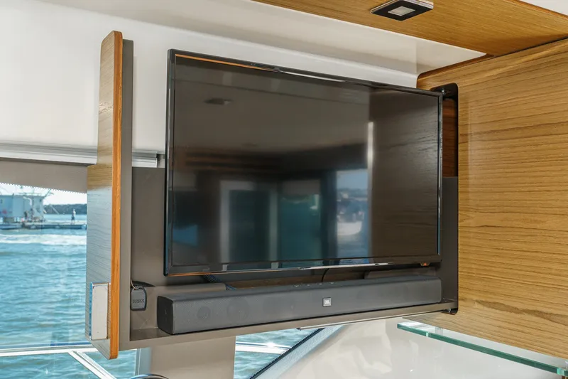 Slide: The Image of Flat-screen TV and soundbar on 2021 Tiara C 44 Coup yacht interior. - 22
