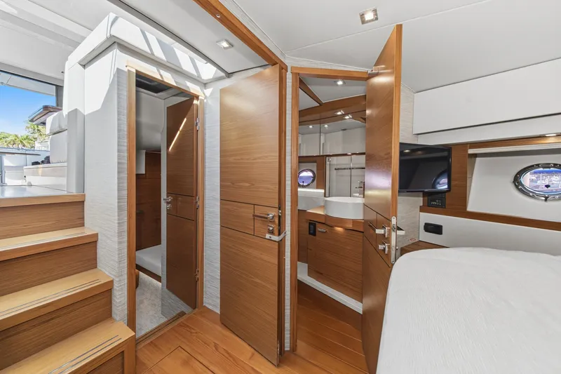 Slide: The Image of Luxurious interior of 2021 Tiara C 44 Coup yacht with modern wood finishes. - 34