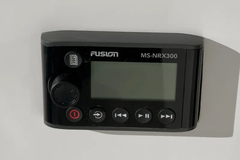 Slide: The Image of Fusion MS-NRX300 marine stereo remote on Tiara C 44 Coup, 2021 model. - 9