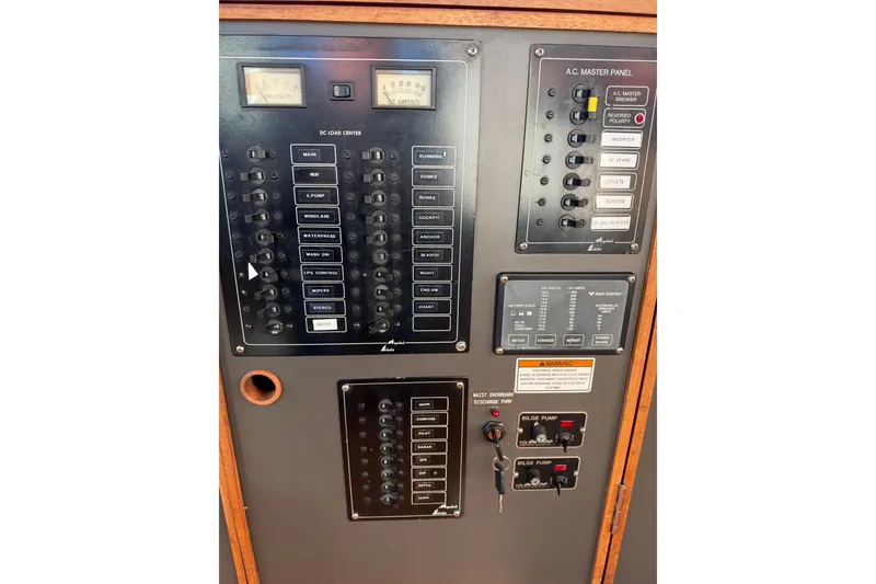 Slide: The Image of Electrical control panel on a 1997 Covey Island Spencer Lincoln boat. - 21