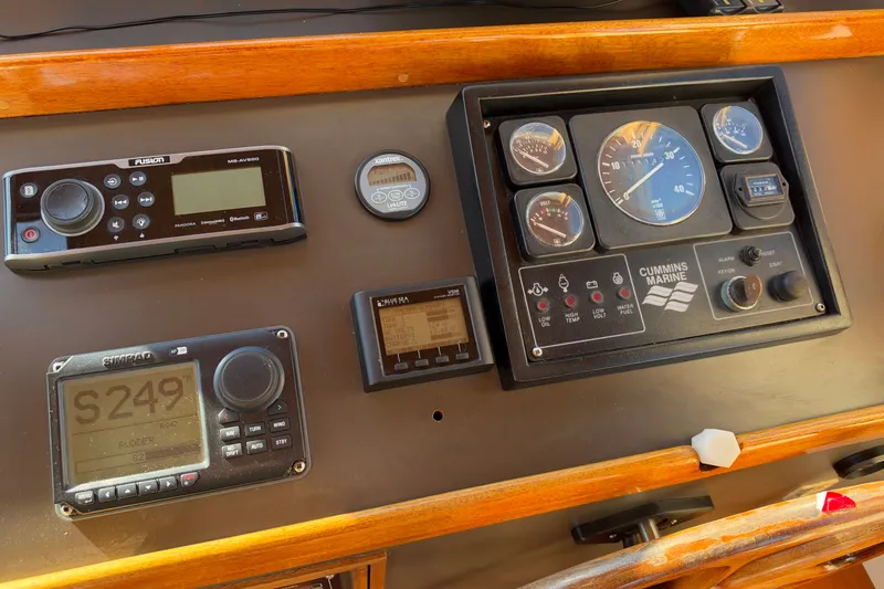 Slide: The Image of Control panel of a 1997 Covey Island Spencer Lincoln boat with navigation instruments. - 20