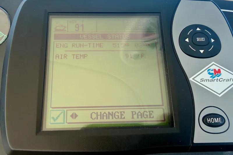 Slide: The Image of SmartCraft display on 2006 Tiara Yachts 3600 Sovran showing engine runtime and air temperature. - 56