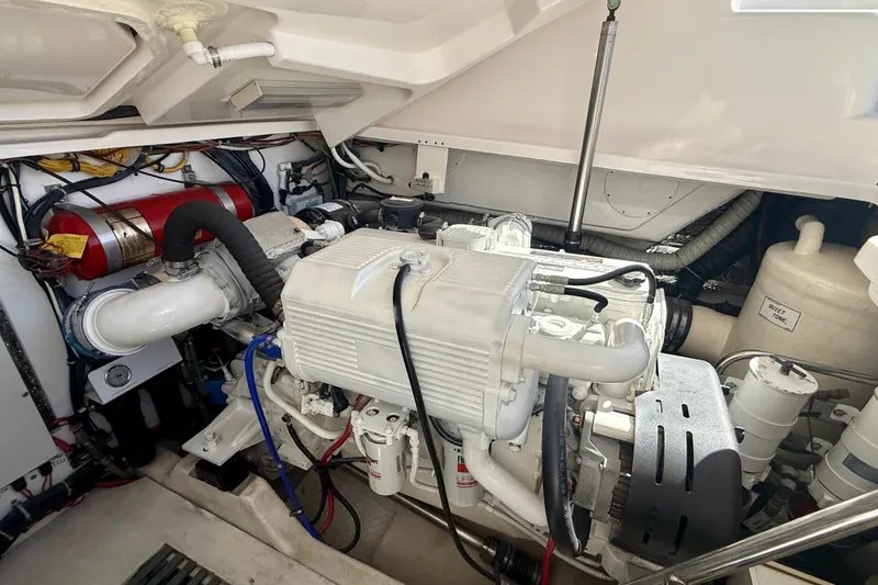 Slide: The Image of Engine room of a 2006 Tiara Yachts 3600 Sovran, showcasing mechanical components. - 65
