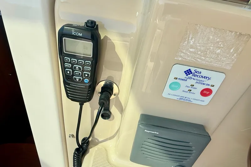 Slide: The Image of ICOM marine radio and Sea Recovery system on 2006 Tiara Yachts 3600 Sovran. - 59