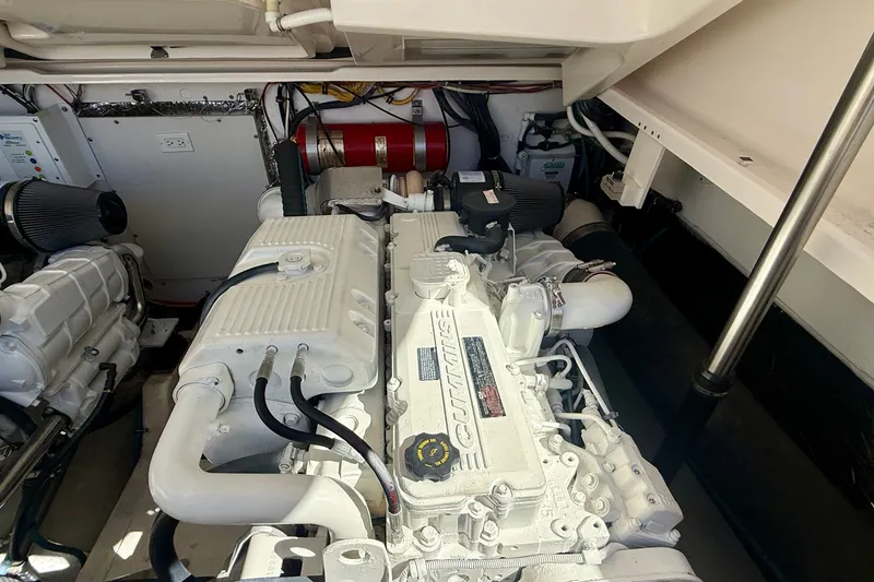 Slide: The Image of Engine room of a 2006 Tiara Yachts 3600 Sovran, featuring a Cummins engine. - 63