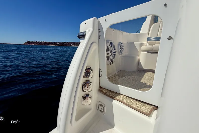 Slide: The Image of 2006 Tiara Yachts 3600 Sovran boat interior with ocean view and seating area. - 53