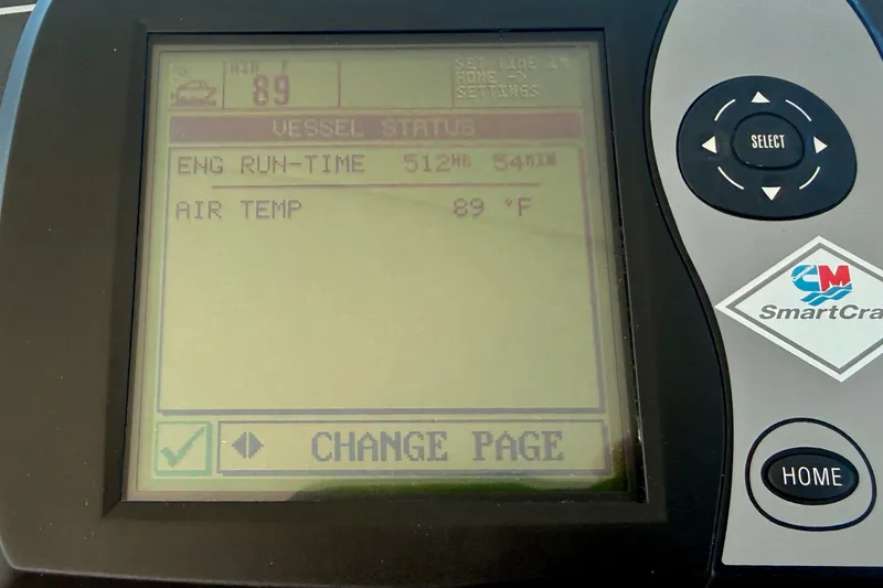 Slide: The Image of Display screen of a 2006 Tiara Yachts 3600 Sovran showing engine runtime and air temperature. - 55