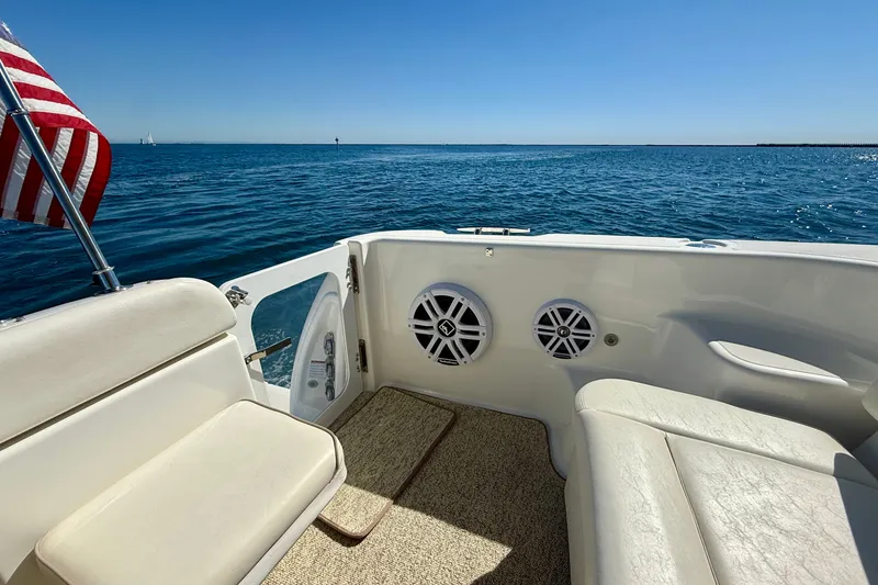 Slide: The Image of 2006 Tiara Yachts 3600 Sovran cockpit with seating, speakers, and ocean view. - 38
