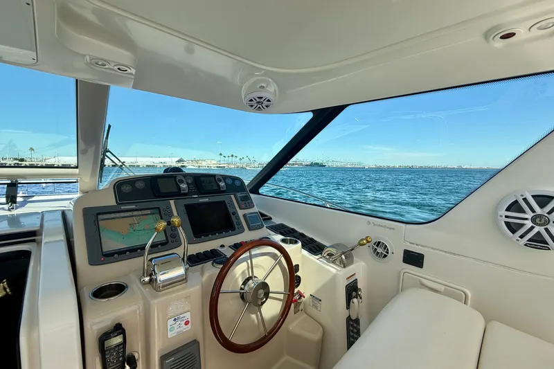Slide: The Image of Helm of 2006 Tiara Yachts 3600 Sovran with navigation equipment and ocean view. - 40